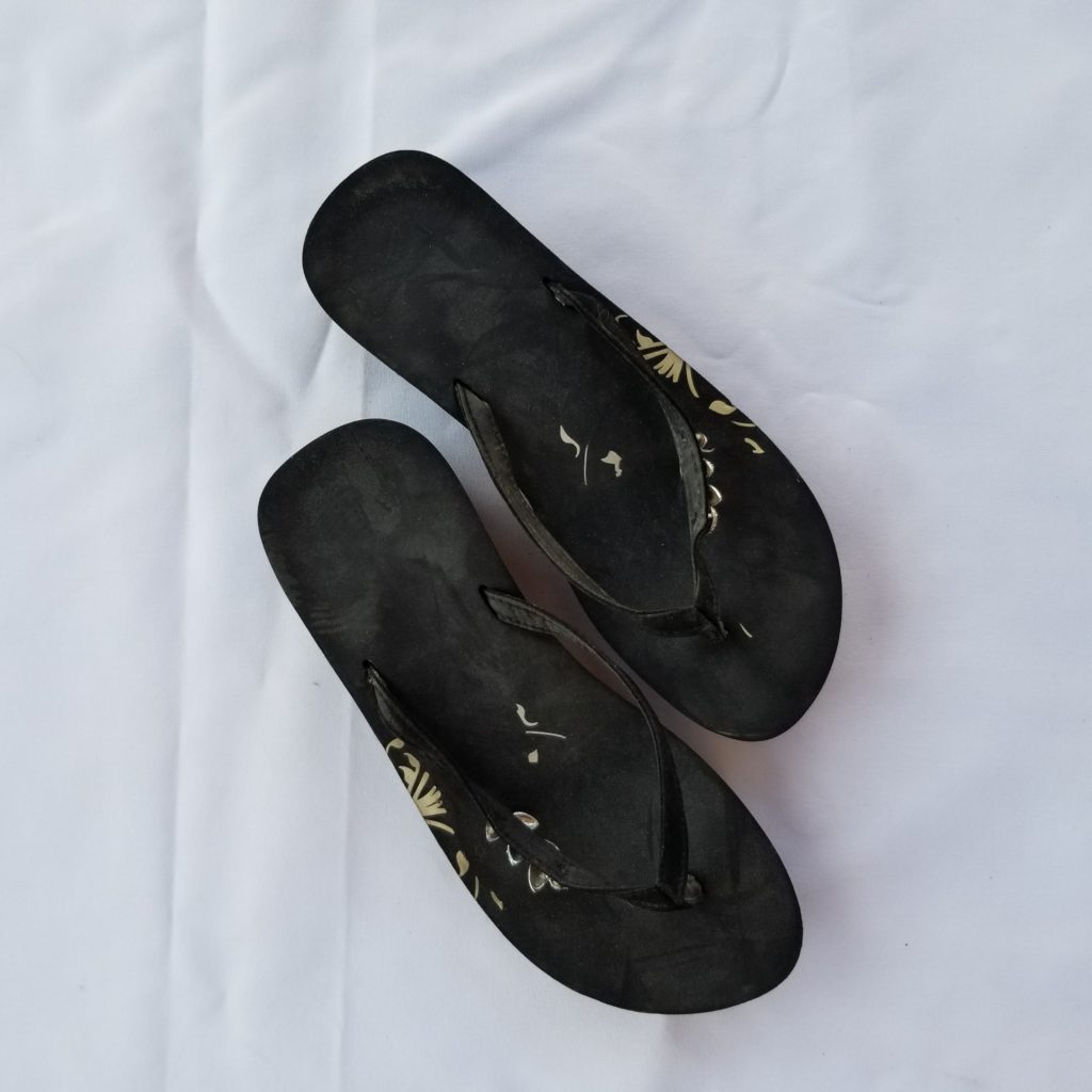 Well Worn Pink Flip Flops